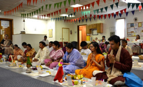 Performing the Samuhika Satyanarayana Puja, August 2012